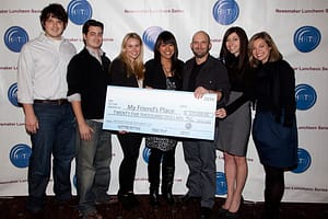 JHRTS presents a check for $25,000 to My Friend's Place